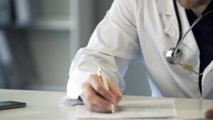 Doctor hand writing