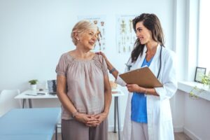 doctor working with a patient