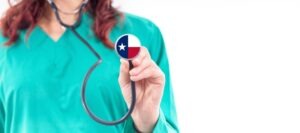 A female nurse holding a stethoscope with a Texas symbol.